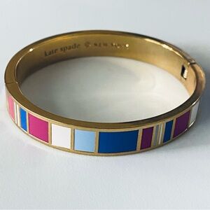 Kate Spade, ( "it's what's inside that counts" ) Gold Enamel Hinged Bracelet.